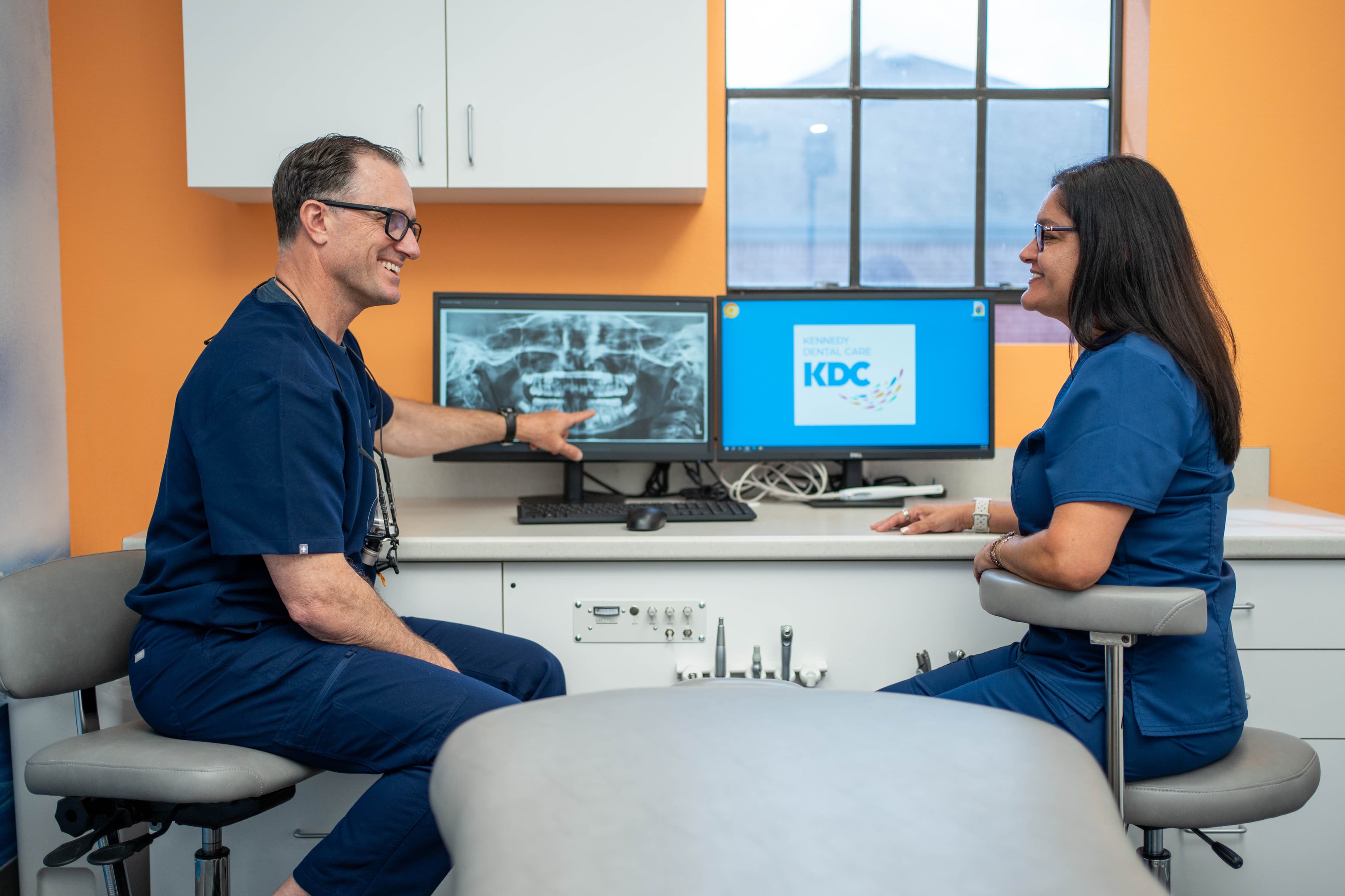 KDC team members reviewing X-rays