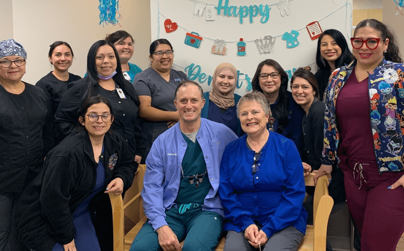 The Kennedy Dental Care team celebrating
