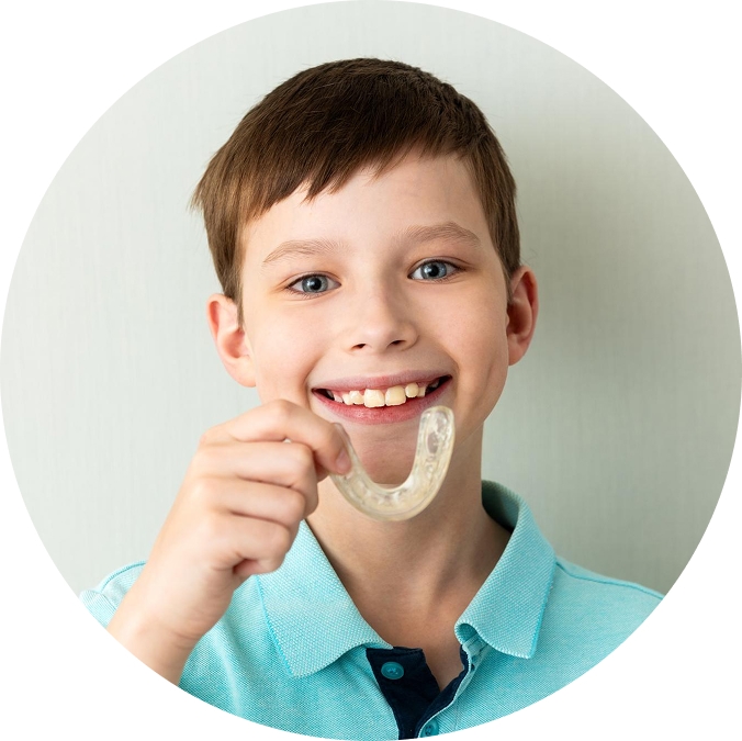 Happy patient after a dental cleaning at Kennedy Dental Care