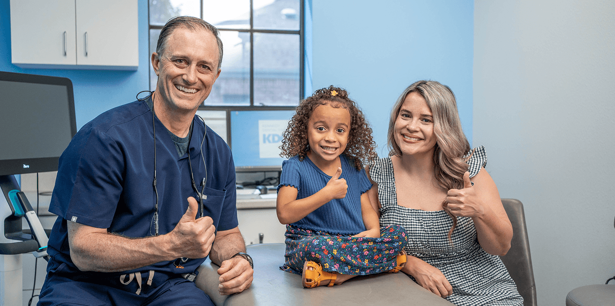 A family receiving dental care at Kennedy Dental Care